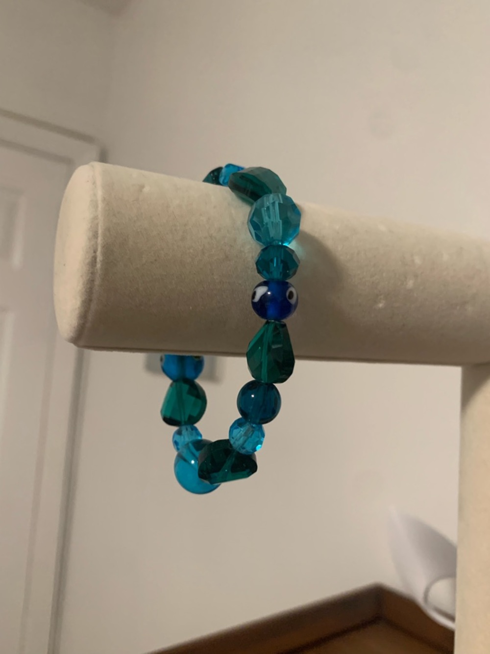 Teal Beaded Bracelet with Blue Accent Bead